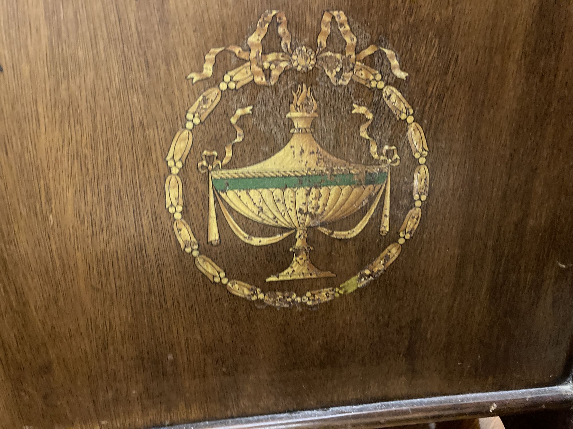 An Edwardian mahogany stencil decorated newspaper stand, width 37cm, depth 22cm, height 102cm